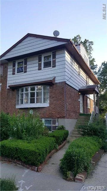 Large 2, 600 Square Feet House On Quiet Residential Street Includes Garage, Basement And Backyard Use. Laundry In Basement And Central Air Conditioning Throughout. Convenient Bus Transportation With Q27 To 7 Train, Q30 To F Train And Qm5, Qm8, Qm35 Express Buses. Zoned For Ps 203, Ms 158. Two Blocks From Cardozo Hs And Queens Community College.