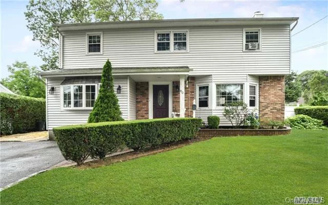 Legal M/D With Permits. Spacious & Beautifully Updated Colonial Set On Over Sized Property In The Heart Of Massapequa Park! This Home Features Eik W /Granite Counter Tops. Gleaming Hardwood Floors, Andersen Windows, 10 Yr Old Roof, Windows & Siding, 2 Yr Old Gas Heating System & Hot Water Heater. . Close To Shopping & Train.