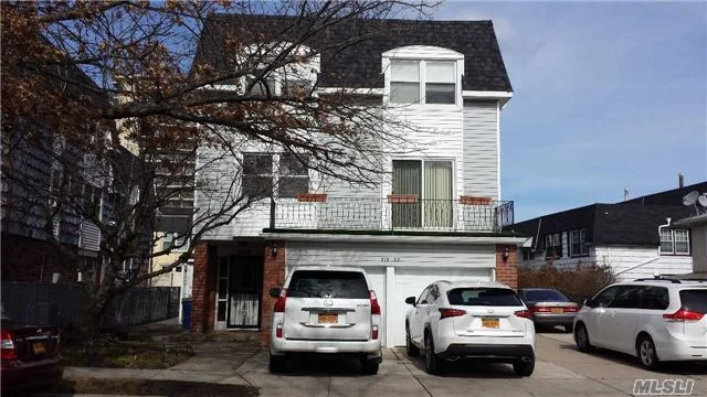 Updated With New Kitchen And 2 New Bath Few Years Ago. Parking For 2 Big Cars. Very Spacious Duplex With A Private Entrance. New Central Ac. 1.5 Blocks To Manhattan Express Buses And Flushing Main Street Buses. 3 Blocks To Bay Terrace Shopping Mall. Quiet Residential Area.