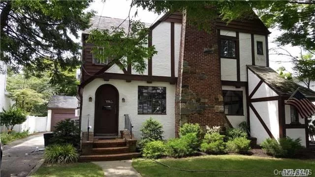 Beautifully Renovated 2 Bedroom, 2 Bath In A Lovely Tudor Style Home. 1st And 2nd Floor.Huge Living Room. Fireplace. Located On A Quiet Tree Lined Street! Minutes To Shopping, Restaurants, Lirr, Public Transportation. Use Of Backyard.