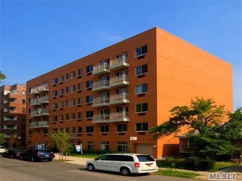 Built In 2009, 1 Br/1 Bth Apt Facing A Beautiful Tree-Lined Street Features A Contemporary Kitchen With Stainless Steel Appls, Private Balcony & Spacious Rooms. This Unit Is 703 Sq.Ft + 24 Sq.Ft. Balcony. Indoor Parking Available For Fee. Close To E & F Trains, Q20, Q44 & Q46 Buses As Well As Express Buses To Nyc.