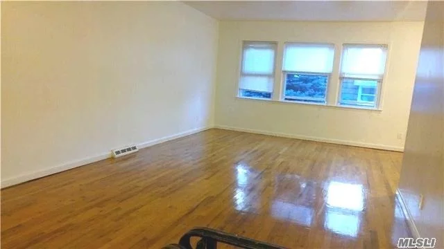 Spacious Split Layout,  Big Brs, Granite Eik,  Hardwood Floor Thruout,  Driveway Parking Fo 2Cars,  Washer Dryer In Unit,  Walk To Cardozzo, Qcc,  Buses For Q27, Q30, Qm5, Qm8, Qm35