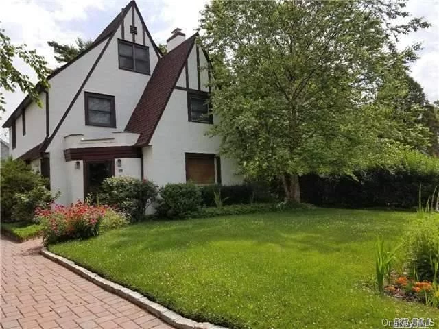 Fabulous Tudor. Move-In Condition. Beautiful Landscaping. Large Eat-In-Kitchen. Formal Dining Room. Nice Entertaining Flow Throughout First Floor. 3 Bedrooms On Second Level. 4th Bedroom And Bath On Third Floor.