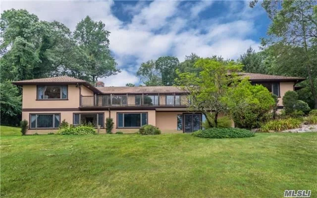 Watch The Sunset On Oyster Bay Harbor From The Deck Of This Mid-Century Modern Home. Year Round Waterviews Set On 5 Secluded Acres On Top Of The Hill. Formal Living Room With Fpl, Gourmet Eat In Kitchen, Office W/Fpl, Unbelievable Master Suite W/2 Bathrooms, Ldry, 7 Bedrooms, 5 Baths, Elevator, 4 Car Garage