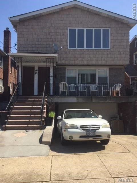 Walk To Bus Stop And Shopping, 10 Minutes To Downtown Flushing Train Station. Near Botanical Gardens. Near Public Transportation And Buses. Has Solar Panels On Roof.