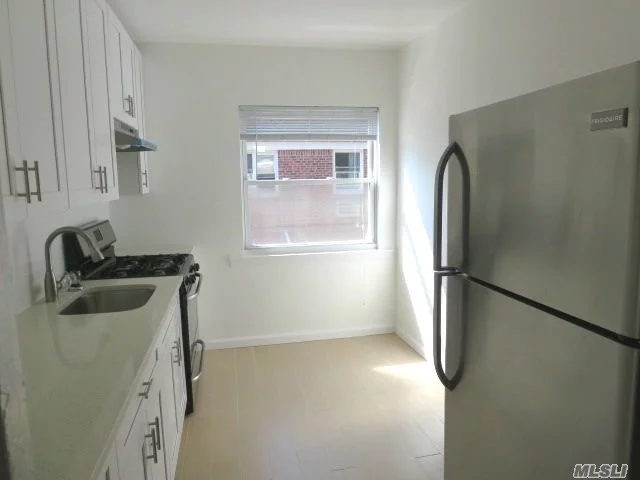 Great. Bright & Sunny 2 Br, 1 Ba Apt. Featured On 2nd Fl Of 2 Fam, Semi-Det Pvt Home. Renovated, Separate, Eat-In-Kit W/ Window, New Granite Counters, Cabinets, And Flrs. Renovated Bath With Floor To Cieling Tiles. Wall To Wall Carpet Throughout. Lg Liv Rm, Separate Dining Area, And Good Sized Br&rsquo;s. Tenants Only Pays Electric And Cooking Gas. Great Sd #26, Near All.