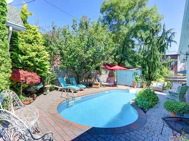 Large & Exquisite Updated 2 Fam (Used As1Fam). 3100&rsquo; + Basement. Conveniently Located Between Heart Of Town/Train & Beach/Bdwk. Quietly Nestled In The Prestigious Estates Area. Fenced Double Lot, 2 Driveways. Beautifully Landscaped Around W/Tranquil Ig Pool&Patio. Brand New Kitchen, Custom Cabinets, Sub-Zero/Wolf Appl. All The Comfort And Charm Needed For Beach Living & More!!!