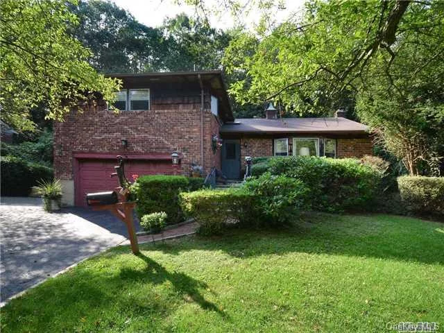 Third Of An Acre, Tree-Lined Property. Vintage Feel Makes This Home Truly Unique. Entryway W/ Stained-Glass Skylight Leads To Large Living Room, Formal Dining Room, & Classic Kitchen W/ Island, Ample Storage, & Dining Space. Master Bedroom With Full Bath, Two Additional Bedrooms & Full Bath On Second Floor. Lower Level Has Fireplace & Half Bath. Wood Floors Under Carpet.