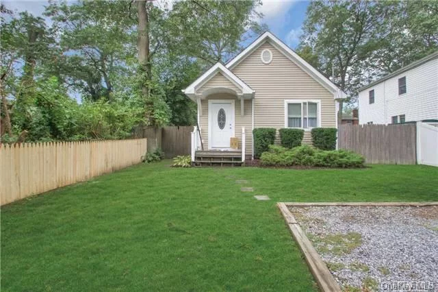 Perfect Starter 2 Bedroom Ranch. Featuring Wood Floors, Updated Kitchen And Bath. Full Garage And Central Air.