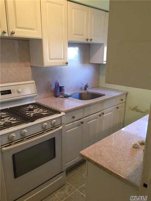 Corner Unit Drenched In Sunshine, Renovated Kitchen With Opening Into Dining Area, Courtyard Location, School District 26, Close To Buses, Express Bus