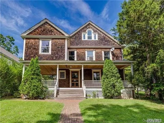 Charming Folk Victorian On Large Property In Glen Cove. Original Wood Work Throughout Featuring Foyer With Fireplace, Large Living Room With Fireplace, Den And Dining Room With Wood Burning Stove. Eat In Kitchen With Back Staircase To 2nd Floor. 4 Bedrooms With 1.5 Baths. Wrap Around Porch Leading To Yard With 1 Car Garage And Car Port. Large Unfinished Attic & More