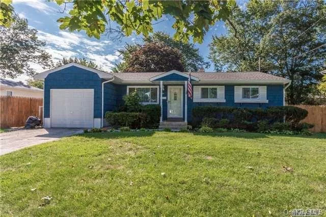 Islip Schools! Lovely Ranch Features Brand New Roof, New Windows, Hw Floors, Full Basement With Outside Entry, Gas Hot Water Heat And Well Kept Property, Located In Islip School District!!! Do Not Miss This One!-