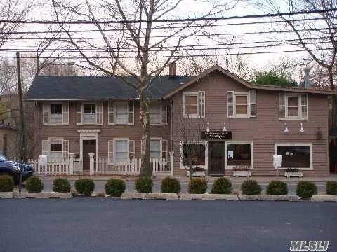 Excellent Investment Property With Total Renovation 10 Years Ago. Well Built 3 Story Building. 10/11 Parking Spaces, Currently 5 Unit Mixed Use. But Can Be 6 Units. Nice Backyard With Pond, Beautiful Apartments. Heart Of Roslyn Commercial District. Cap Is Over 5.2