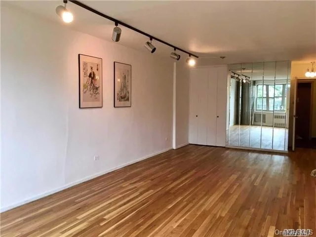 Large Jr 4.5 Converted To 2 Bedrooms.Newly Refinished Hardwood Floors Throughout, Overlooking Private Homes