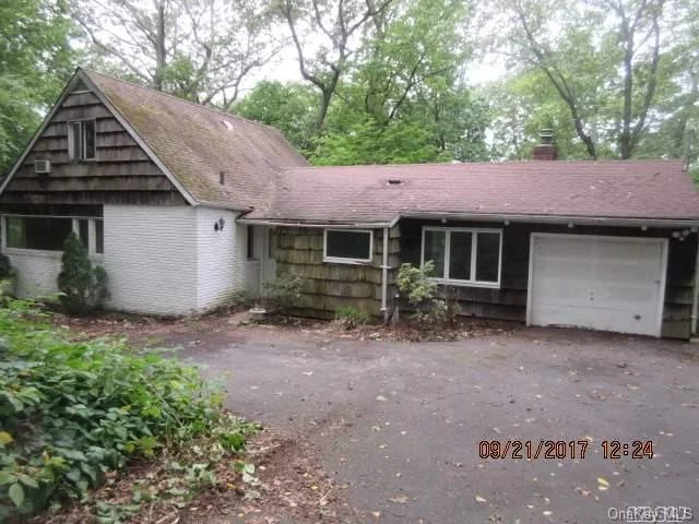 It Won&rsquo;t Last...In Need Of Renovation. Great Living Space In This Raised Ranch Home Located In A Nice Cul De Sac In Huntington. Big Lot That Will Allow Great Expansion Of The House. The Entry Foyer Opens To A Living Room Combo Dining Room With Brick Fireplace. The Layout Flows To A Formal Dining Room, Kitchen And Family Room With A Door To Backyard Patio.