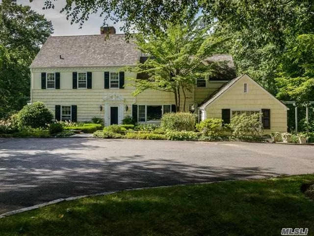 This Charming Colonial Surrounded By English Gardens Is Tucked Away On 5 Plus Acres Backing Up To The Tiffany Preserve. Perfect For Outside Entertaining On The Covered Patio, Overlooking The Beautiful Pool And Manicured Property, The House Features Four Bedrooms With One Of Which Is On The Main Floor. First Time On Market In 45 Years. Taxes Being Grieved!