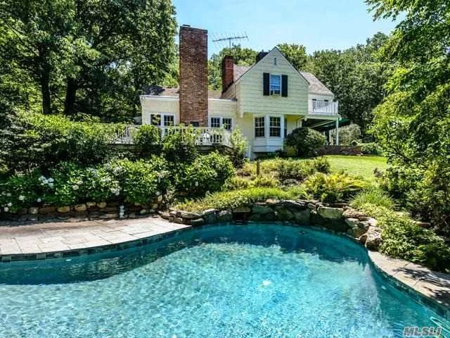 Oozes With Charm-Surrounded By English Gardens-Tucked Away On 5+ Acres Backing To Tiffany Preserve-Perfect For Outdoor And Indoor Entertaining-Covered Terrace Overlooks Beautiful Pool And Lush Property-House Features 4 Bedrooms-One On Main Floor- Location Convenient To Town-First Time On Market In 45 Years! Tax Grievance Under Way