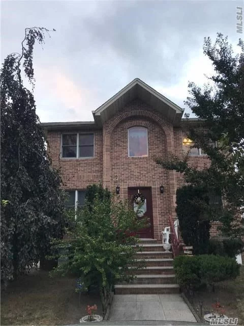 Beautiful Two Family House In A Quiet Tree Line Street, The House Was Rebuilt At 2003, Hardwood Floor, High Celings,  Open Kitchen. Central Air Conditioning, Full Finished Basement. Express Bus To Manhattan.Zoned For Ps184, Jhs194,   Bayside High School.