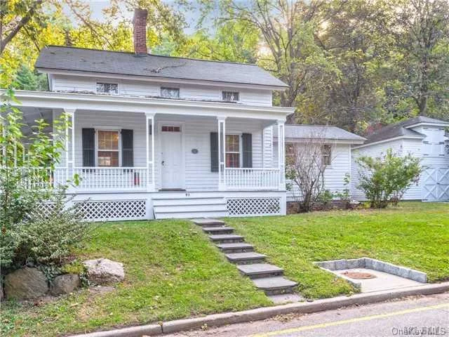 This Charming Historic Home Originally Located Within The William Cullen Bryant Estate Has Maintained Its Old World Beauty And Charm.Perfectly Nestled In The Heart Of Roslyn Village & Across From Beautiful Gerry Pond, This One Of A Kind Home Offers Original Wide Plank Floors, Wood Burning Fireplace, Recessed Lighting, Wraparound Porch, Oversized Garage & Endless Possibilities!