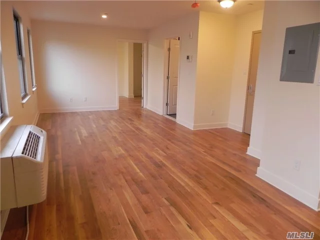 Luxury Brand New 1 Bedroom Apts In Elevator Bldg In The Heart Of Pw, Across The Street From Lirr. Hardwood Floors Thru-Out, New Windows, Individual Heating/Cooling In Each Room, Control Access/Video Intercoms. Kitchen W/Stone Countertops, Stainless Steel Appliances. Gorgeous Bath W/Faux Calcutta Marble Tile. Laundry On-Site!