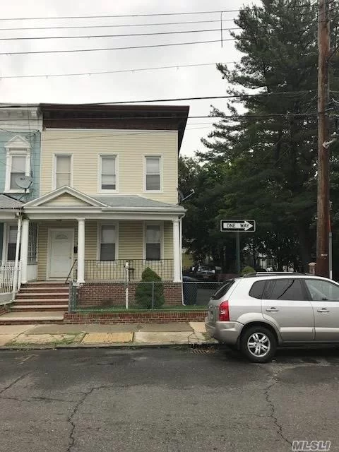 Well Maintained Legal 2 Family Home. Large Apt To Accommodate The Entire Family. Open Front Porch,  Large Lot Next Door Must Be Purchased Separately, Home Owner Is The Custodian Of The Neighboring Empty Lot. We Are Just Selling The House.