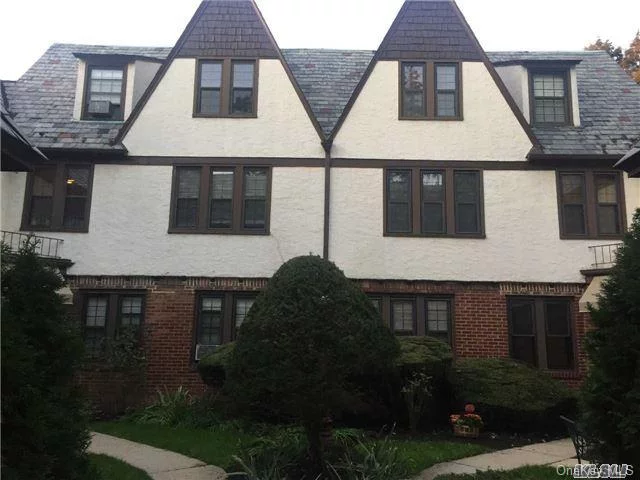 ***Welcome Home***Spacious 1 Bedroom Apartment Located In A Tudor Building Nestled In A Quiet Lushly Landscaped Courtyard On A Tree Lined Street With A Common Area And Bbq...Featuring Refinished Hardwood Floors, Updated Bath, Lots Of Closets, Dining Area, Laundry Room & Private Storage Cage...Close To All: Lirr, Transportation, Restaurants...And More...