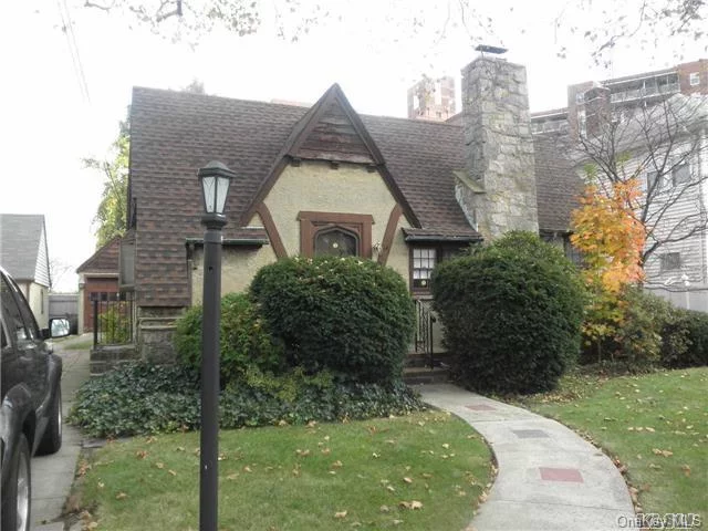 Charming Detached English Tudor With Great Lay Out...Large Formal Living Rm & Dining Rm + Sunny Rooms... Large 35X35 Building Size With Oversized 50X99 Property. Walk To Bayside Oakland Lake , 1/2 Block From Northern Blvd. Walk To Lirr, 28 Min. To Manhattan. Best School Ps203 Dist#26. Must See !