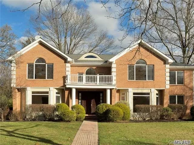 Better Than New!!!! Soaring Entry Foyer 5 Bedroom, 4.5 Baths, Stately Brick Colonial With Intricate Moldings, Detail & Wood Floors Throughout. Double Door Master Ensuite With Closets Galore, East Williston Schools. Bedroom On Main Floor. ***Taxes Have Been Sucessfully Grieved For 2018/2019 At Approximately 12 % Reduction***