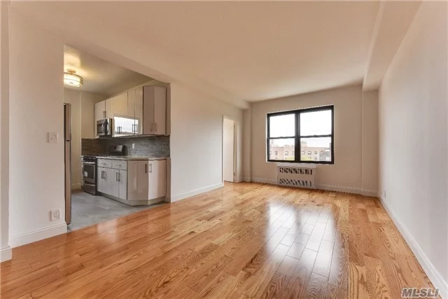 Sponsor Unit / No Board Approval - Stunning, Bright & Totally Renovated Corner Unit - New Stylish Kit W/ Stainless Appl & Quartz Counters - New Bathrooms - New Hrdwd Flrs - Maint Includes Heat, Electric, Gas, Water & R.E. Taxes - Garage & Outdoor Parking Avail Asap (Fee) - Lndry Rm In Bldg - Pets Ok - No Flip Tax - Easy Commute To Nyc - Near Subway, Bus, Dining & Shopping