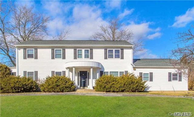 Bright Center Hall Colonial On Flat Property. Circular Driveway. 5 Bedrooms, Large Rooms For Entertaining. Roslyn Schools. East Hills Park/Pool Community.