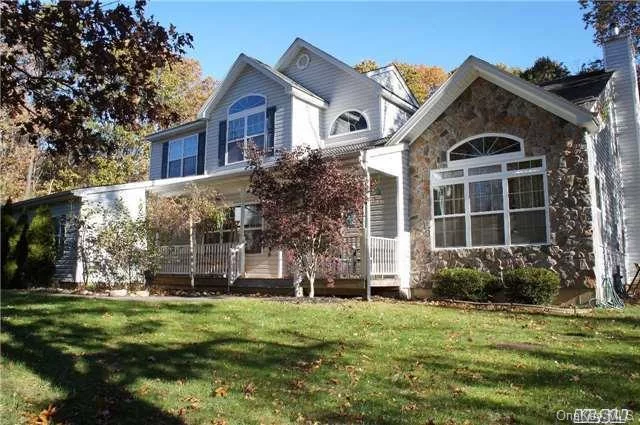 This Fabulous Home Is Situated In The Heart Of Manorville On 2.4 Plus Acres Has It All! Features Include: Lge Eik W/Ss Appl&rsquo; & Breakfast Area, Hardwood Flrs, Central Air, Fam Rm W/Wood Burning Fpl, Mbr Ste W/2 Walk In Closets & Full Bath W/Double Sink, Jacuzzi Tub & Separate Shower, Full Par Finished Basement, 3 Car Garage & More.