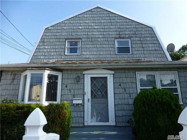 Legal 3 Family With 1 Car Garage. Great Investment With Upside Potential In The Heart Of Cedarhurst. Close To Stores, Lirr, & Park. All Units Separately Metered For Gas & Electric.