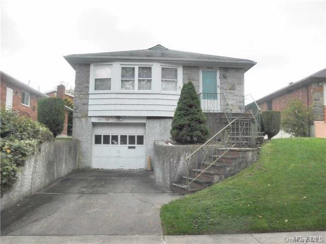 Lovely Detached Brick & Stone Ranch House With 3 Bedrooms, 2.5 Baths, Formal Dining Room, Eat In Kitchen, Nice Hardwood Floors . New Central Ac. 26X51 Building Sized. 4242 Sq Ft Property. Top School District #26, Walk To Cardozo High School & Ps203. Very Quiet Block And Convenient Transportation, Q27 Bus To Flushing!