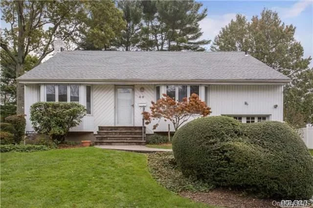 Wonderful, Spacious, 4 Bedroom, 2.5 Baths, Front To Back Split Level Home With Updated Kitchen With Stainless Steel Appliances And Granite Counter Tops. Updated Baths. New Roof, Newer Windows, Huge Property. This Home Has Gas Cooking. It Also Has A Generator. Low, Low Taxes!! Move Right In. All This And Famed Syosset Schools.