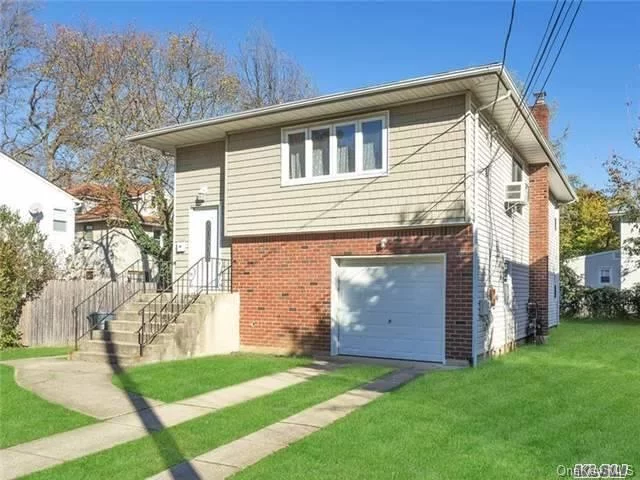 Superb Hi Ranch Centrally Located In Roslyn Heights. This 4-Bedroom, 2-Full Bath Home Has Great Living Space Throughout, Featuring Open & Spacious Living Room/Dining Room, Kitchen, Fam Room/Den With Access To Backyard, Garage & Laundry.