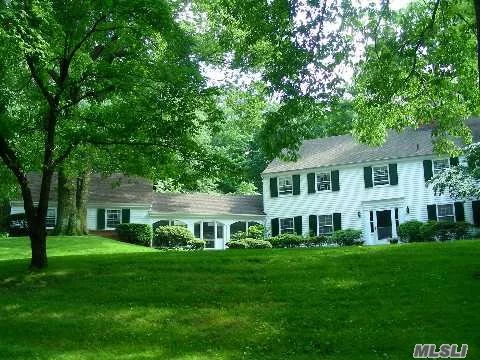 Classic Center Hall Colonial Abutting Sagamore Hill. 4 Private Acres With Bluestone Patios, Walls, Gardens And Winter Water Views. Updated Ensuite Master, Large Bedrooms W/ 2 On 1st Floor- Ideal For Live-In Family Or Home Office (See Floor Plan)  New Updates Include Windows, Baths, Systems, Hardwood Floors, Sprinklers..... Low Taxes! Gracewood Beach Association (Dues)