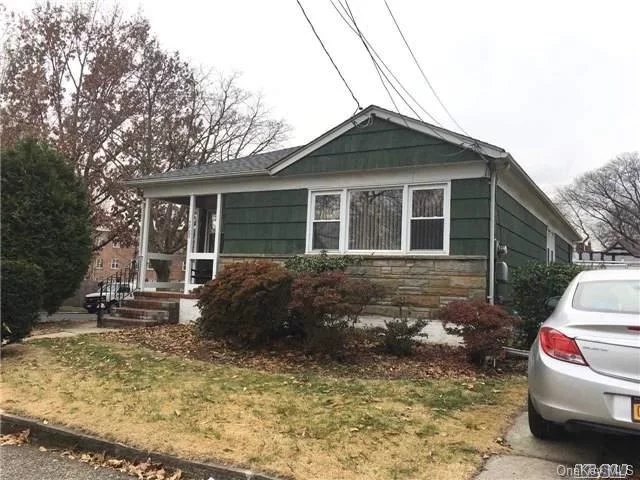 Corner Of The Charming Sunny Ranch Face To East South. In The Heart Of Oakland Gardens, Low Tax Large Corner Lot 5000 Sqft , Features 3 Br, 2 Baths, Hardwood Floor, With Great Layout, Large Basement, Large Back Yard, #26 Best School Distract , Walking Distance To Q27, 31, & Super Market, Bell Blvd. Must See!!!