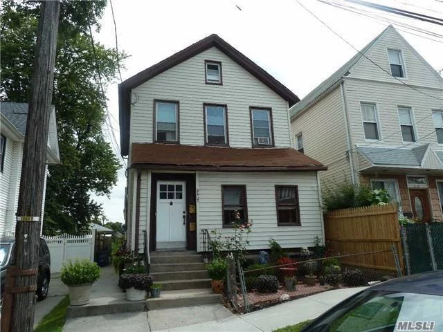 2 Family House In The Heart Of Bayside. Features 4 Bedrooms, 2 Full Bathrooms, Attic And Full & Unfinished Basement. Located In Quiet Residential Area. Near Lirr, Mass Transit, Parks, Schools, And All.