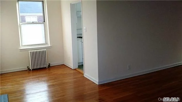 Totally Renovated 2nd Floor Apartment, New Kit/Bath, Hard Wood Floors, Walk To Shopping And Lirr.