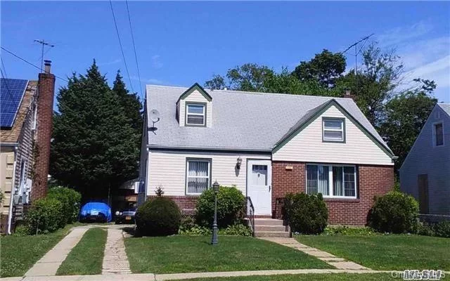 3 Bedrooms, 2 Baths In Prime Location In Hempstead. Updated Kitchen, Open Layout On The First Floor. Hardwood Floors, Gas Cooking, New Tile Floor And New Ceiling In Basement, New Oil Tank, New Boiler, New Washer/Dryer, New Stainless Steel Appliances. Near Hofstra University And The Coliseum. Large Detached 2 Car Garage.