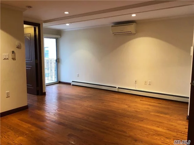 Beautiful Renovated Apartment, Features Include A Full Bath, Modern Kitchen, Beautiful Hardwood Floor, High Efficiency Air Conditioner And Heating Units. Storage Room. Washer And Dryer In Unit. Convenient To Transportation And Shopping. Q64 To Forest Hills, Q65 To Flushing , Express Bus To Manhattan.