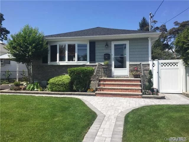 Owner Says Sell Updated W/$80K Plus New Big Tix Items Completed Between 2013-2016 Incl Stone Front-Stone Pavers-Steps-Drivewy-Carport-Gas Burner-Hw Heater-Cac W Air Purification-Nat Gas Bbq Hook-Up-Gleaming Hw Floors- New Corian Bath-Maple Eik-New Roof-Win W Custom Blinds-Siding-4 Zone Ugs-Wifi Thermost-Mid Block In 10 Rated Charles Campagne Elem-Walk Lirr-Super Low Taxes!