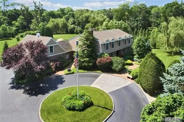 Custom Brookville Colonial With Master Suite On First Flr. Perfectly Located On Open Country Club 2Acres With Beautiful Ig Pool. Generous Sized Eat-In-Kitchen W/Center Island Open To Family Room. Custom Moldings Throughout, 3 Car Garage With Potential Large Bonus Room Above. Beautifully Finished Large Basement W/Great Room, Gym/Den, Large Bedroom And Full Bath & Storage...