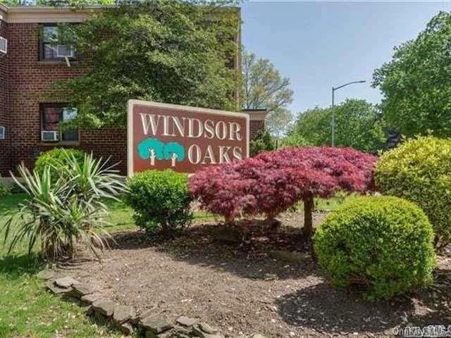 Beautiful 2 Bed, 1 Bath Upper Unit At Windsor Oaks. Updated Kitchen & Bathroom. Washer And Dryer. Spacious Rooms, Ample Closet Space. Corner Unit With Lots Of Sunlight. Pet Friendly (Dogs And Cats Okay). Near Shopping, Transportation And Alley Pond Park. Outdoor Parking Included. (Garages For Rent). Low Maintenance With Heat, Hot Water And Gas Included. No Flip Tax.