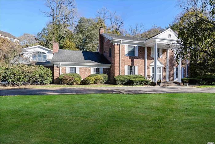 Classic Colonial In Spectacular Location. Large Principal Rooms Including Fabulous Family Rm With Vaulted Ceiling And Fireplace. Living Rm And Formal Dr Each With Fireplace. Updated Eat In Kitchen, Deluxe Master Suite. Private 2 Bedroom Guest Quarters. 3 New Baths, Full House Generator, Stone Patio, 3 Car Garage And More.