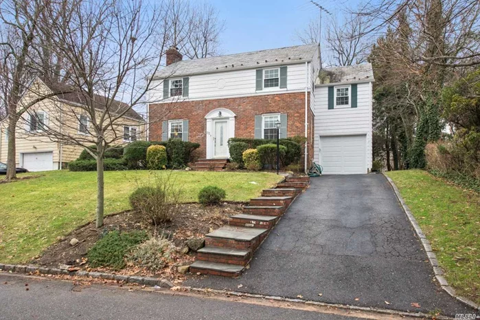 A Move-In Ready Brick Center Hall Colonial Boasts 4 Br And 2.5 Bath Home, Sizable Family Room Overlooked By A Tremendous Eat In Gourmet Kitchen, A Light Filled Living Room Nestled Around A Cozy Mantled Fireplace, Further Is An Incredible New Three Seasons Patio. This Modest Exterior Will Surprise With Its Refined Impeccable Spacious Interior. Come See For Yourself.