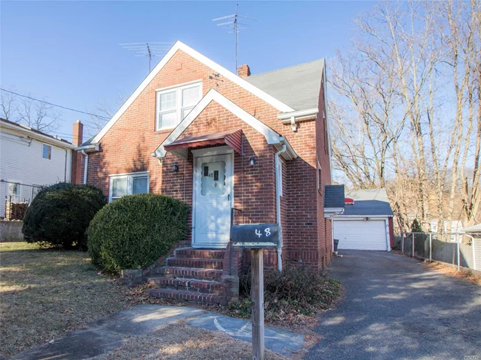 Great Opportunity To Live In Oyster Bay. Charming Brick Duplex. Update Your Way And Live Minutes From Boating And The Beach. Dining And Town Nearby . Possible Mother/Daughter With Proper Permits.