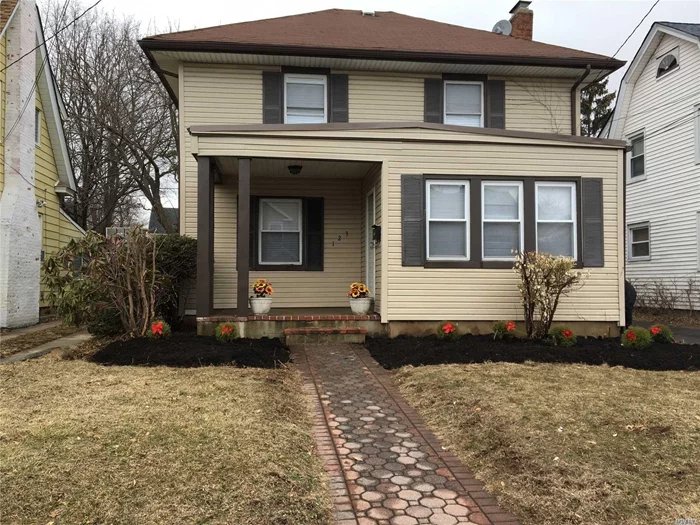 Renovated 3 Bedroom, 2 Bath Colonial With Sun Porch Entrance, New Kitchen, New Appliances, Hardwood Floors, Updated Finished Basement, 2 Detached Car Garage With Long Driveway Can Hold 12 Cars. Beautiful Backyard, Uniondale School, Long Central Location.