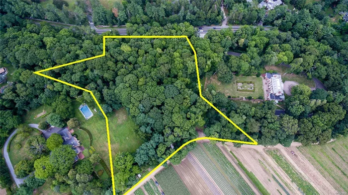 This Lush 5 Acres Of Secluded Level Property Neighboring Historic Farmland, Is Located In The North Shore School District.