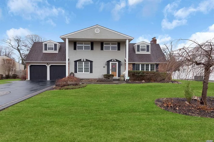 Beautiful 5 Bedroom 2.5 Bath Colonial Located In St Marks Area Offers Wood Floors Throughout, Huge Lr W/Gas Fireplace & Custom Built In Book Shelves, 2 Master Size Suites, Granite Lined Kitchen, Pretty Enclosed Porch/Den W/Cathedral Ceilings, 2 Car Garage.